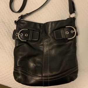 Black leather Coach over the shoulder handbag